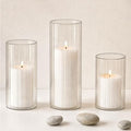 12 Pack White Pillar Candles with Ribbed Glass Cylinder Vases by Unknown