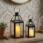 TRIROCKS Set of 2 Black Decorative Lanterns 13"&10" H Metal Candle Holders with Tempered Glass for Christmas Home Decor Living Room Parties Wedding Halloween Tabletop Indoors Outdoors - Image 2