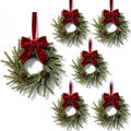 6 Set Christmas Hanging Wreaths Small Artificial Pine Cedar Wreaths with Red Velvet Ribbon Pine Cones Mini Faux Evergreen Wreath for Front Door Porch Cabinet Window Xmas Holiday Home Decorations by Unknown
