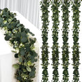 YIJXPOIN Eucalyptus Garland, 8 Packs 6FT Green Flower Garland Decor, Artificial Faux Eucalyptus Leaves Greenery Vines for Table Runner Wedding Bedroom Mantle Centerpieces Backdrop Decorations by Unknown