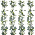 4 Pack Artificial Eucalyptus Garland with White Flowers,5.9FT Greenery Garland Fake Vines Hanging Green Garlands for Table Centerpieces Outdoor Festival Wedding Backdrop Arch Wall Decor by YOUNGLEAVES