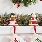Glitzhome Christmas Stocking Holders, Set of 3 Santa Snowman Penguin Mantel Decor with Weighted Base, Festive Jack-in-The-Box Design for Fireplace, Holiday Sock Hangers - Image 4