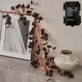 Hairui Lighted Black Eucalyptus Garland with Timer 96 LED Orange and Warm White Fairy Lights,Halloween Garland with Lights 6FT Battery Operated with 10 Functions for Fireplace Halloween Decoration by Hairui