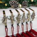 Christmas Stocking Holder for Mantle Set of 6, Reusable Christmas Stocking Hooks, No-Damage Xmas Hanger for Fireplace mantle Grip Stand Christmas Decoration Ornaments Hanging Bronze Shelf Floor by XENTUMI