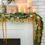 Daifunli 6FT Christmas Cedar Garland with Dried Orange Slices, Bells, Bows - Image 3
