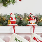 Glitzhome Christmas Stocking Holders, Set of 3 Santa Snowman Penguin Mantel Decor with Weighted Base, Festive Jack-in-The-Box Design for Fireplace, Holiday Sock Hangers - Image 5