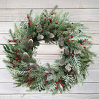 24 Inch Snow Flocked Christmas Wreath with Pine Cones & Red Berries by Montekin
